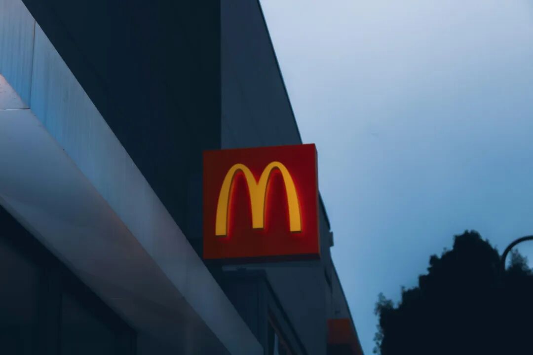 a close up of a mcdonald's sign on a building