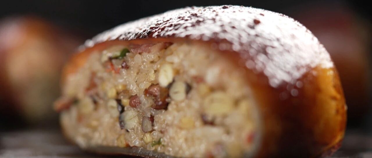 用猪皮包裹五谷，再用棉线缝合的英德年味是啥？