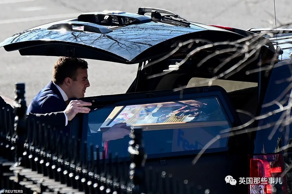 38033730-9149991-A_person_loads_a_photo_of_U_S_President_Donald_Trump_into_a_car_-a-1_1610712937066.jpg Image