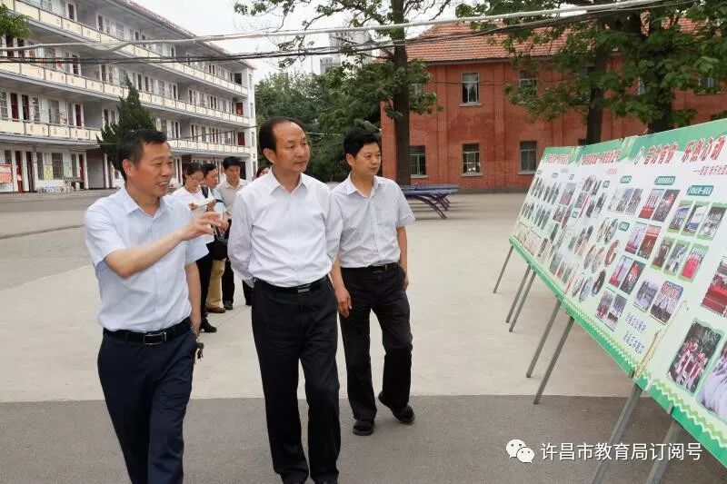 区政府办公室主任王丰伟,区财政局局长王建民,区教体局局长薛建峰参加
