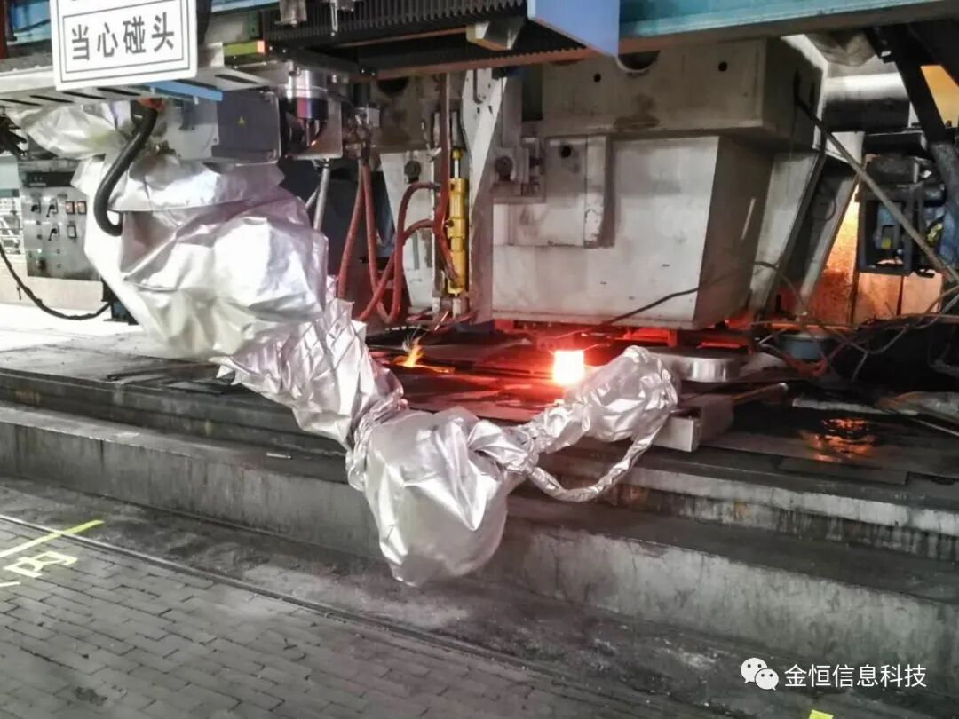 连铸保护渣 山钢日照连铸加保护渣机器人系统成功通过验收