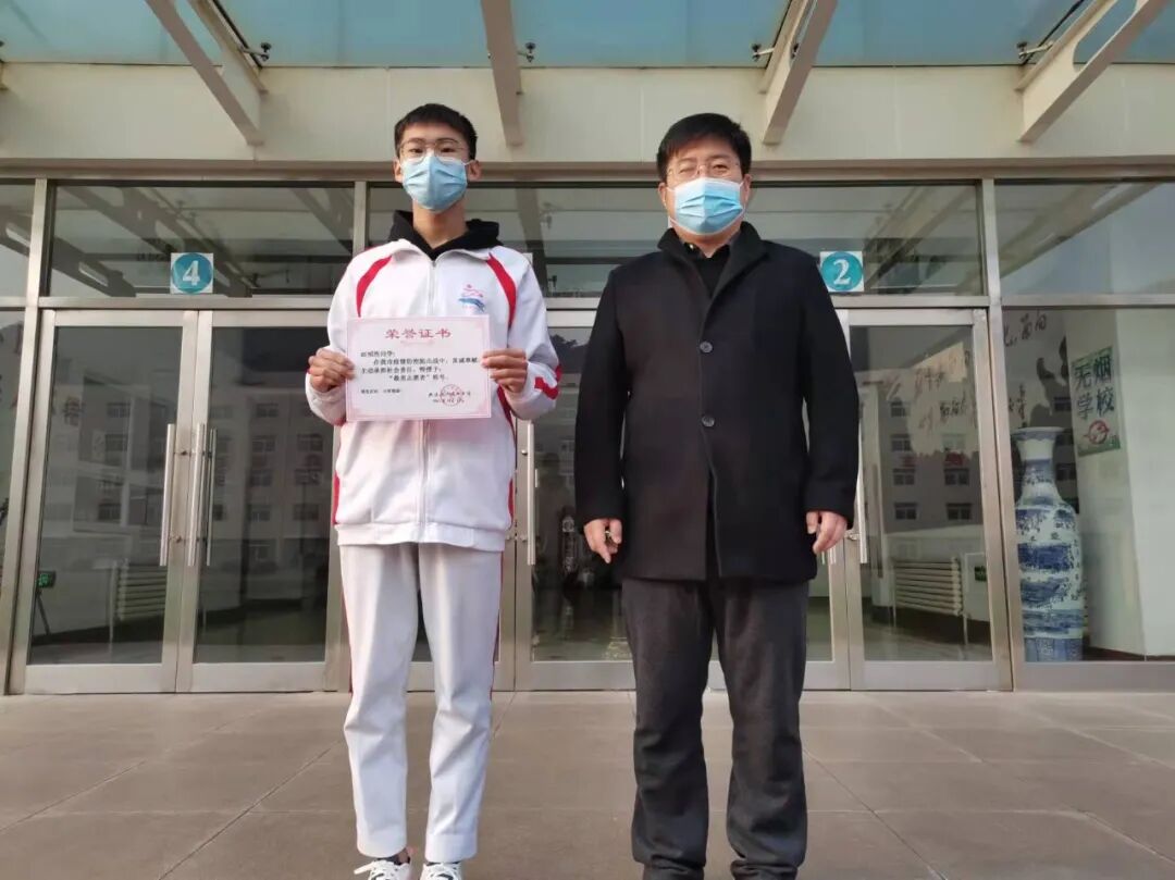 大连甘井子区泉水街道龙园社区居委会向大连金石高级中学寄来表扬信