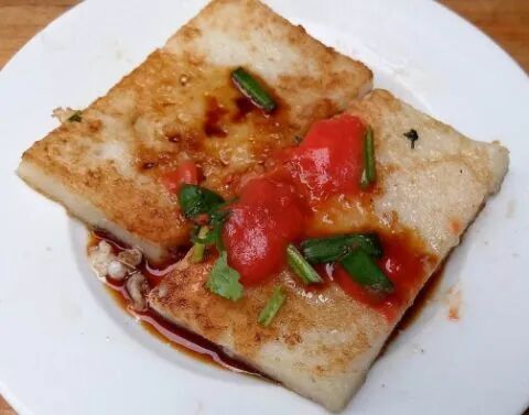 特别适合与清淡口味的小吃搭配尝起来质地绵软,酸中带辣簸箕炊,菜头籺