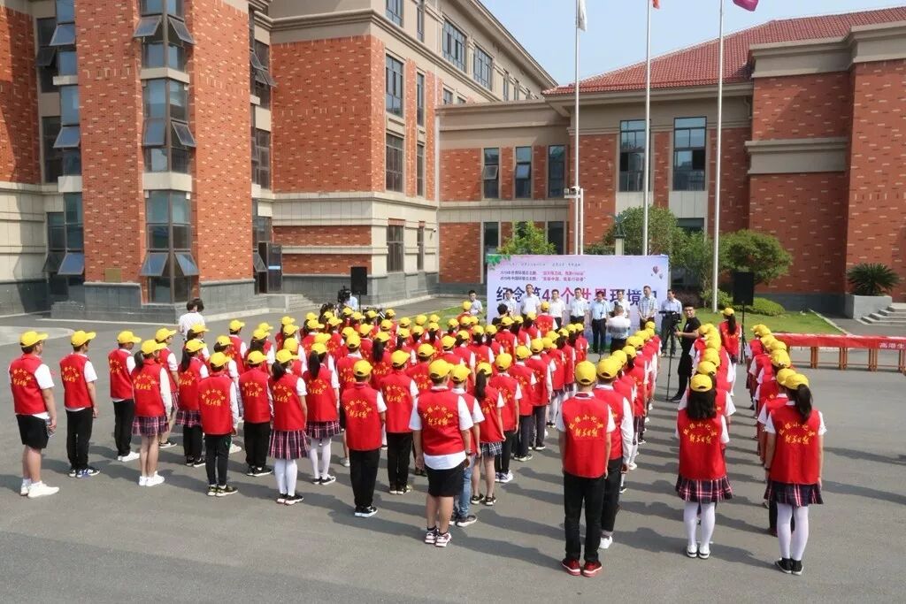 泰州市高港区百名小记者变身“环保小卫士”