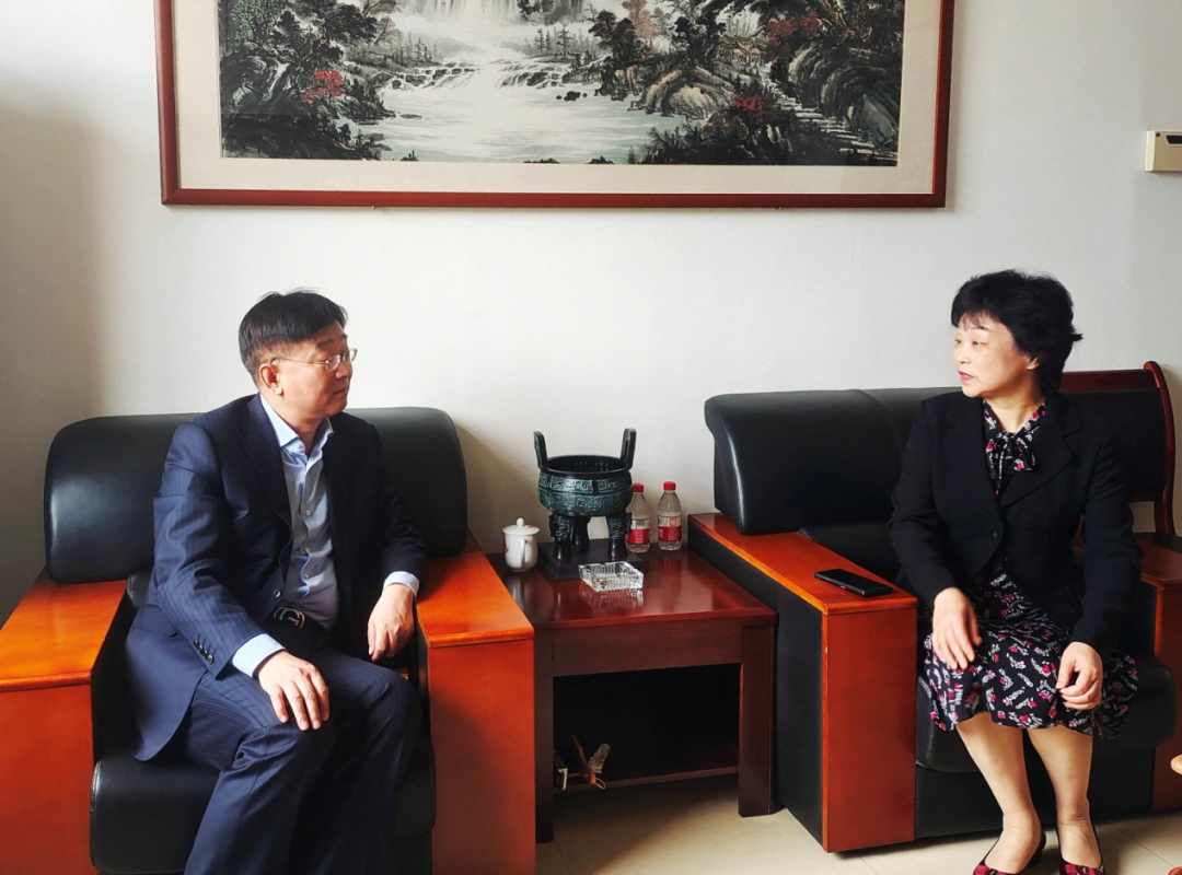 新疆司法警官职业学院院长金箴一行来我校调研交流