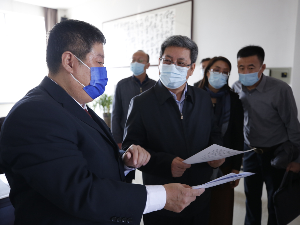 自治区档案馆李淳仁馆长一行来我院调研指导档案工作