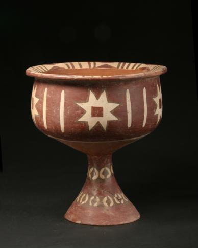 汶河瑰宝八角星纹彩陶豆