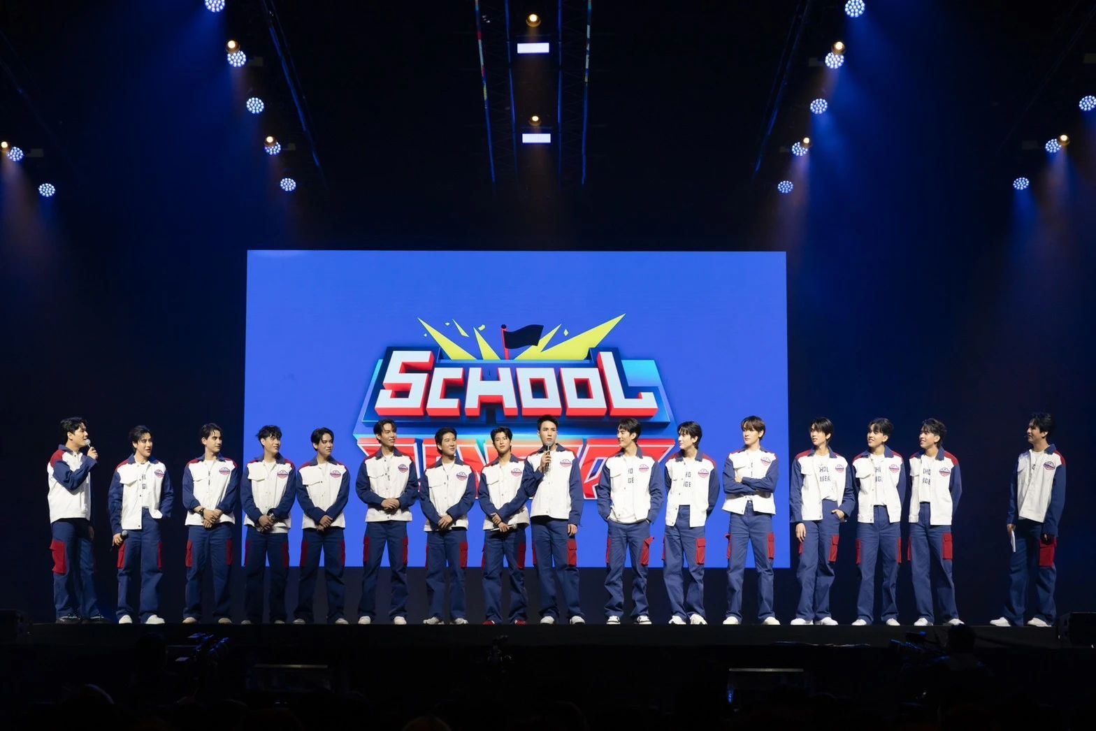 A group of people performing on stageDescription automatically generated