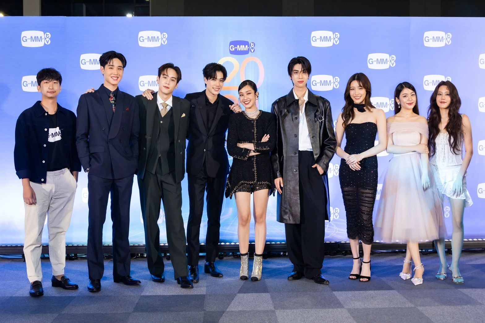 A group of people posing for a photoDescription automatically generated