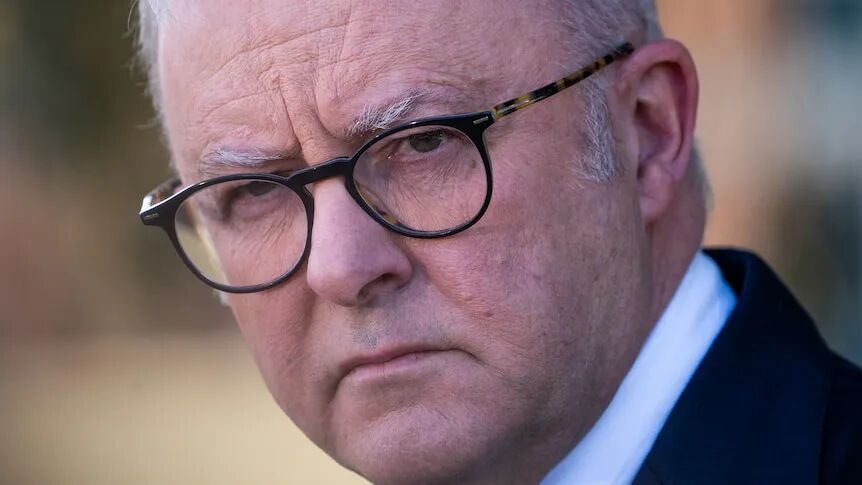 Close up of the face of prime minister Anthony Albanese.