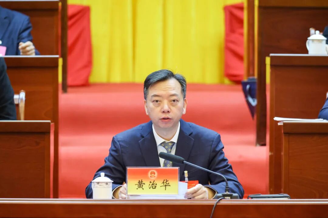 钦北区七届人大四次会议胜利闭幕