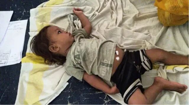 Boy lye down for floor on a blanket