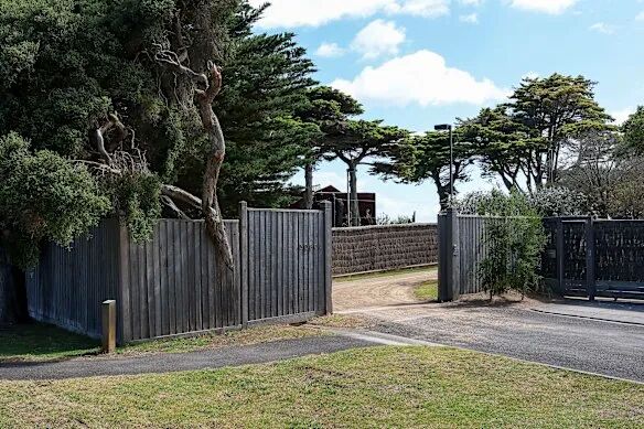 The Sorrento properties of Myer siblings Richard Shelmerdine and Celia Burrell share a driveway, which has become contested turf.