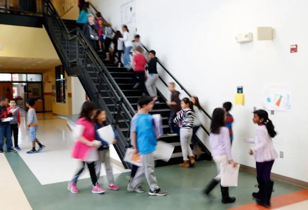 Students move between classes at Mills Park Elementary in Cary, North Carolina, on Nov. 22, 2016.