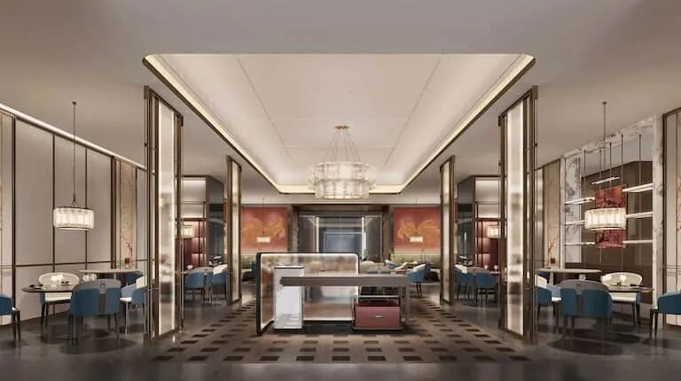 餐厅设有中央接待台、桌椅和艺术隔断。