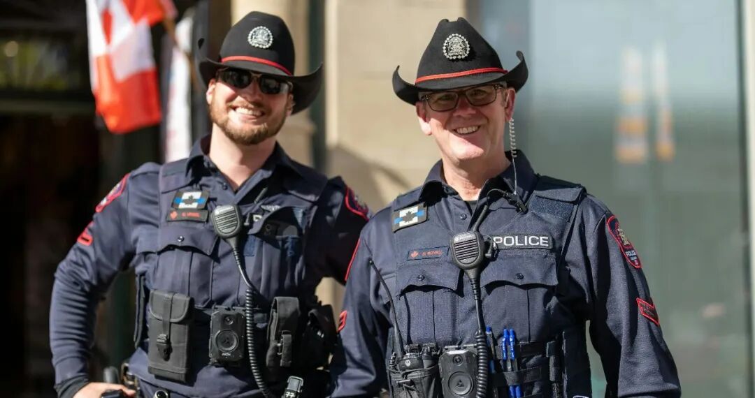 two police officers standing next to each other