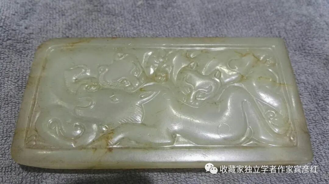 玉海奇珍三汉白玉双虎噬牛纹牌式带扣鲜卑头赏析