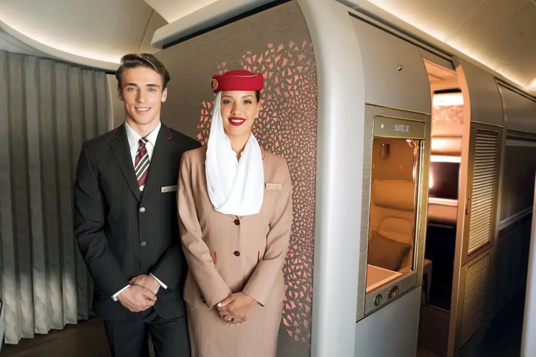 a man and woman standing next to each other