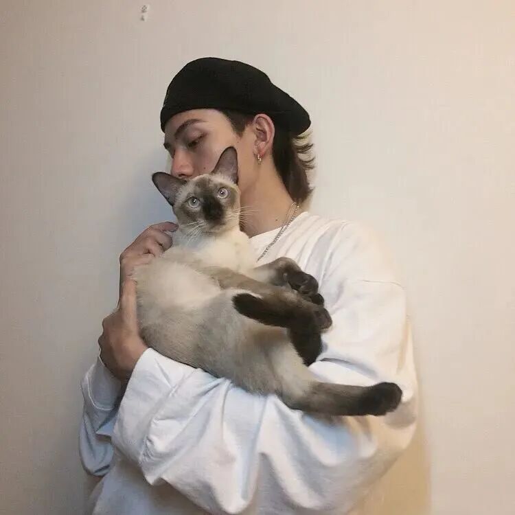 抱着猫咪个性侧脸男生头像