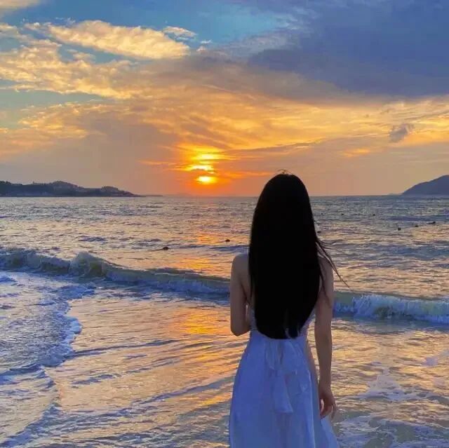 日落海边氛围感不露脸女生头像