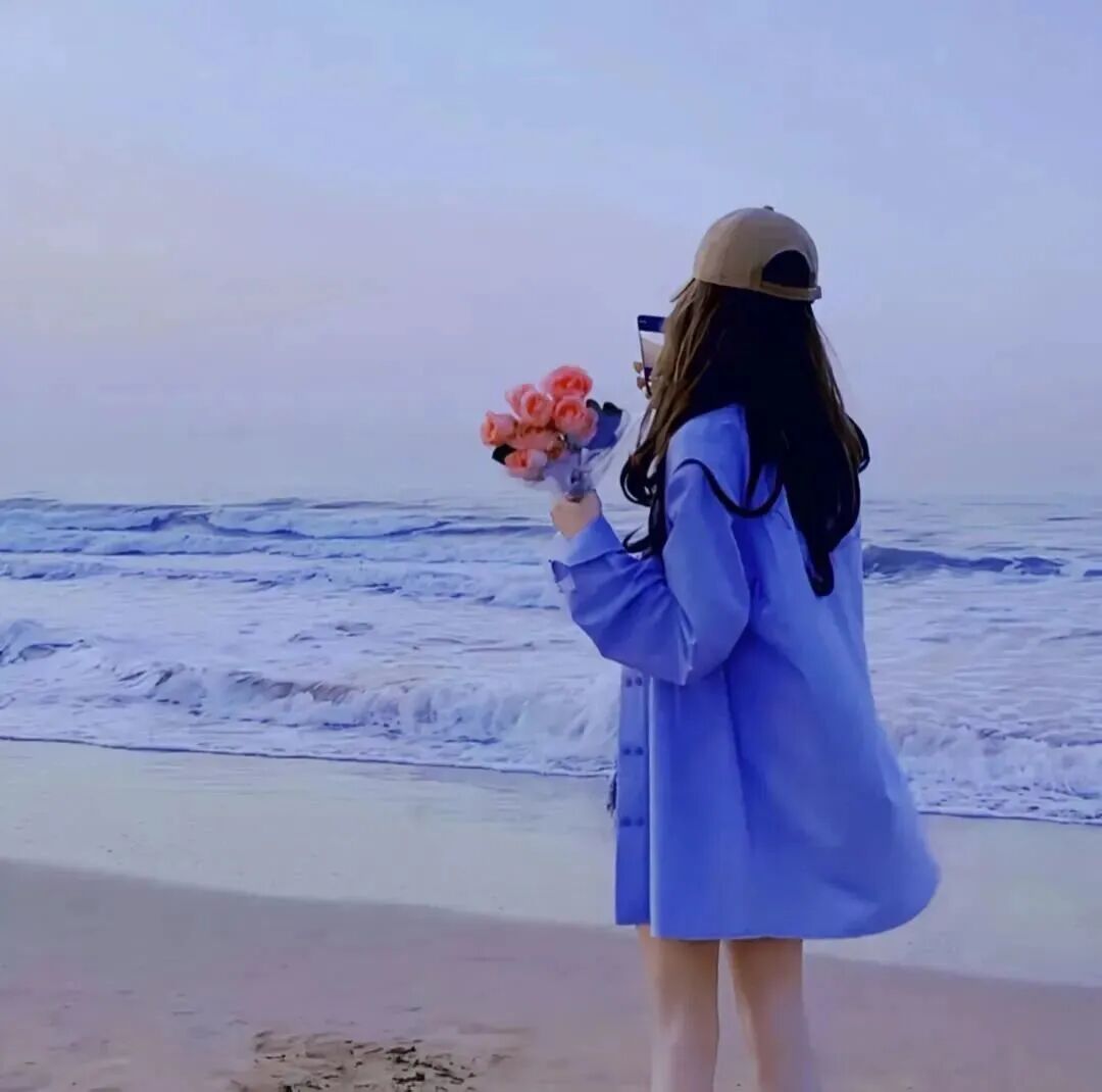 鲜花海边氛围感不露脸女生头像