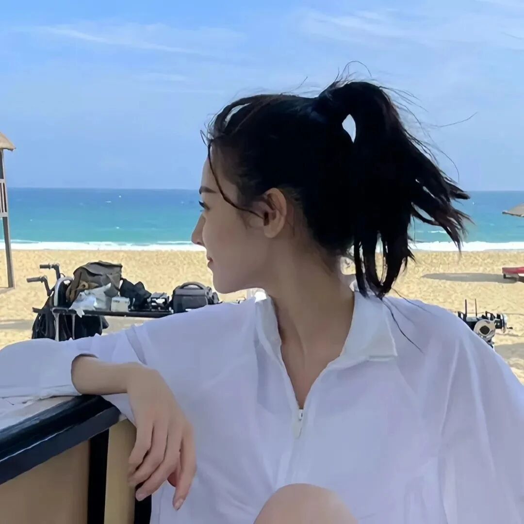 迪丽热巴爱豆海边侧脸女生头像