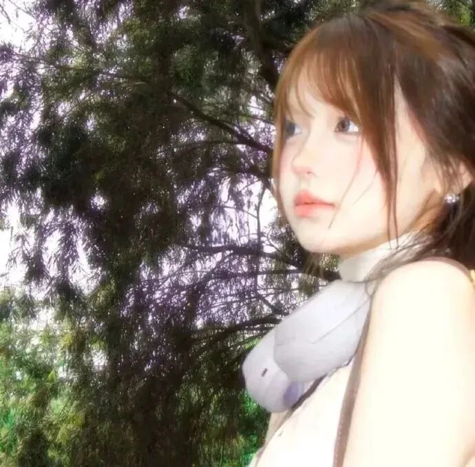 紫色系温柔侧脸女生头像