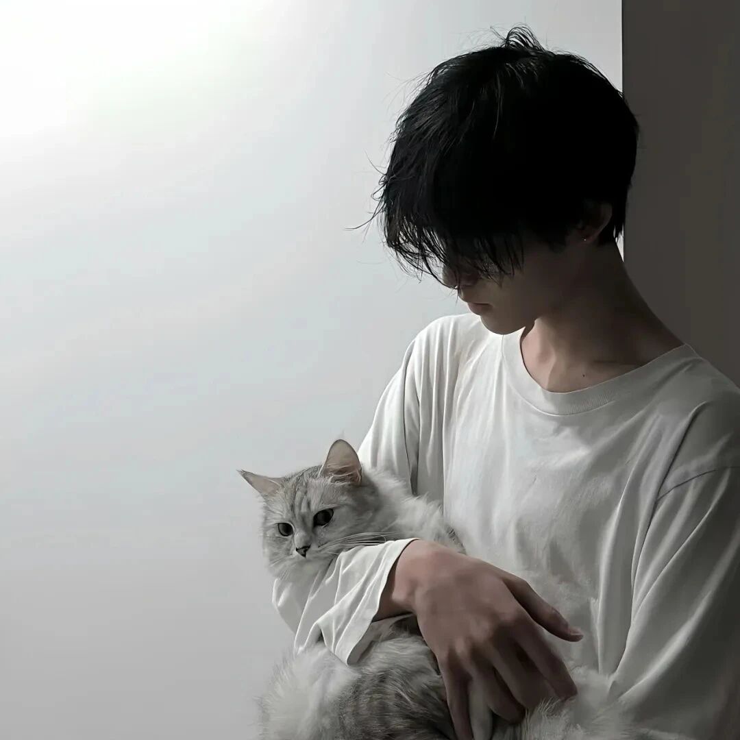 抱着猫咪痞帅侧脸男生头像