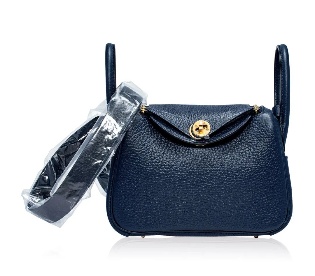 lot 2671爱马仕 2023午夜蓝色clemence牛皮迷你lindy包附金色金属配件