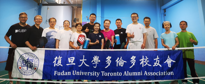 A group of people posing for a photo  AI-generated content may be incorrect.