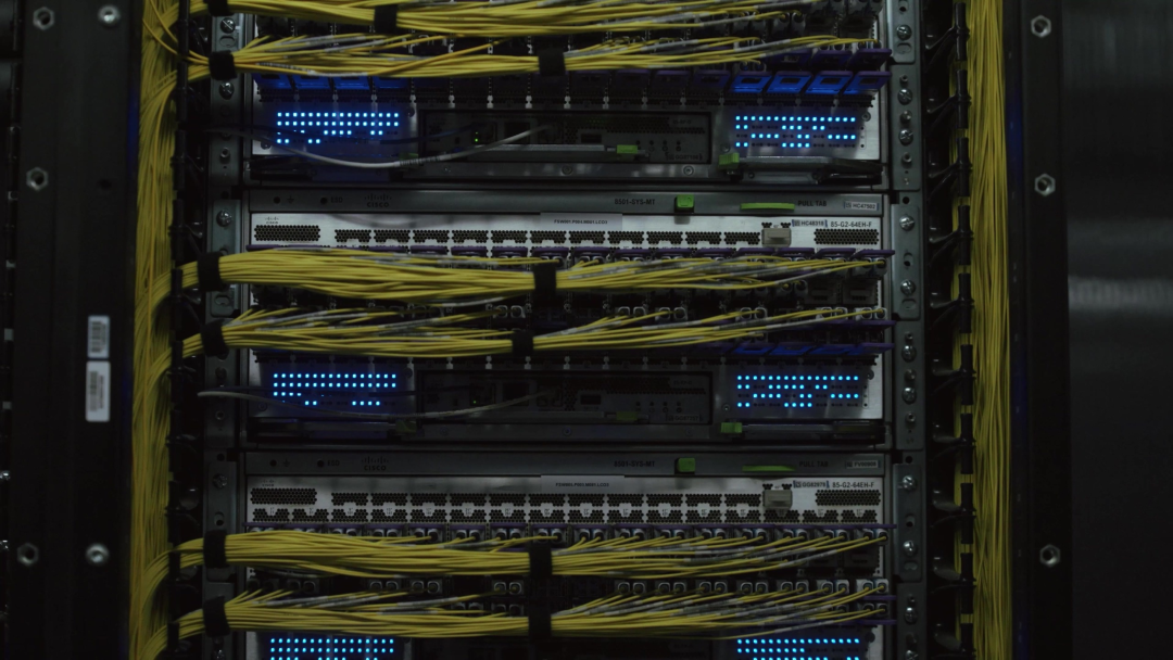 Ethernet fabric switches in a Meta Prometheus network rack with fiber bundles to each port